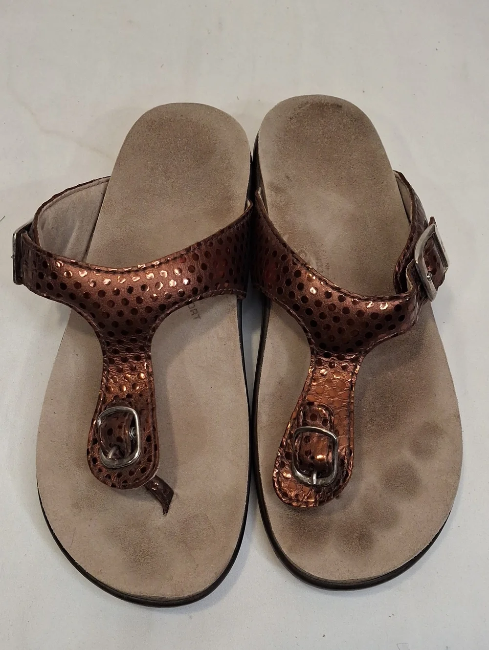 SAS Sanibel Metallic Bronze Gold Thong T Strap Sandals with Gold Buckle Detail.